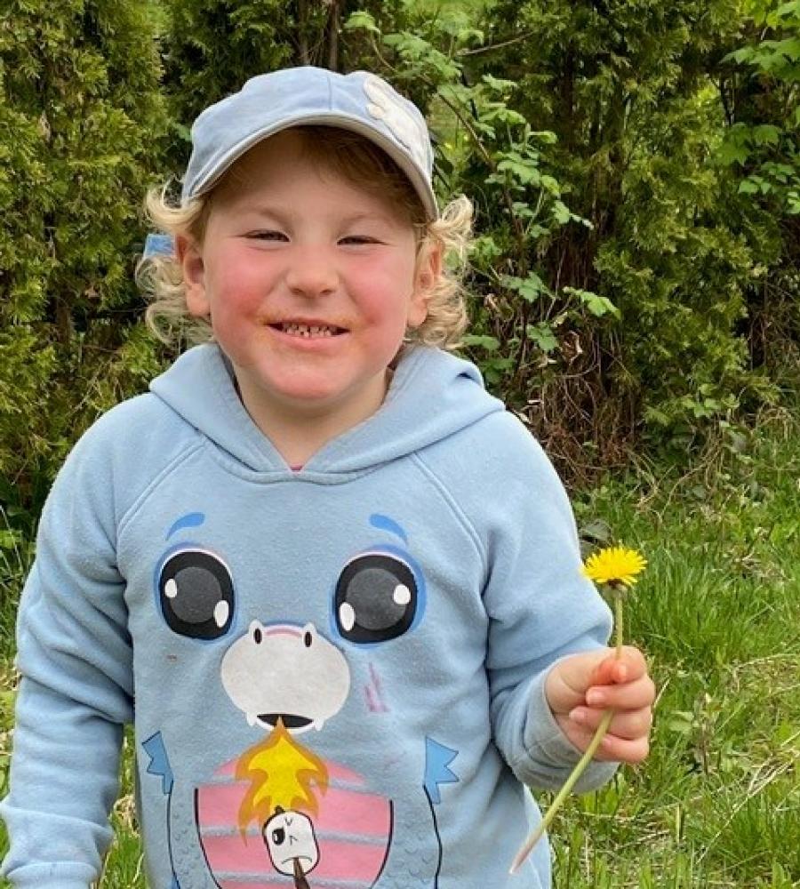 Kid holding flower