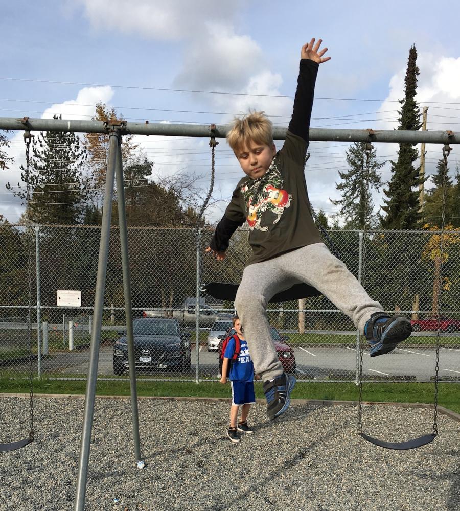 kids on a swing