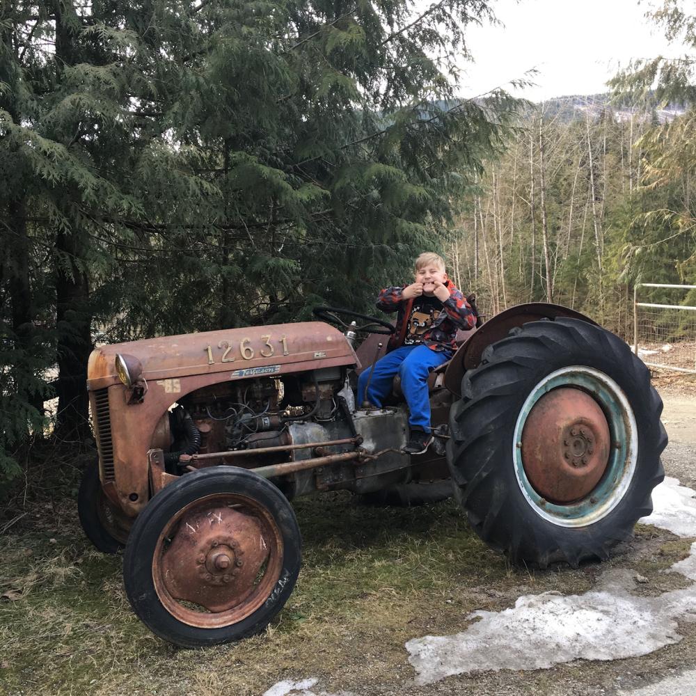 kid on tractor